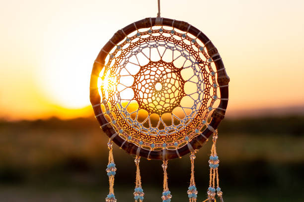 Dream catcher with feathers threads and beads rope hanging. Dreamcatcher handmade