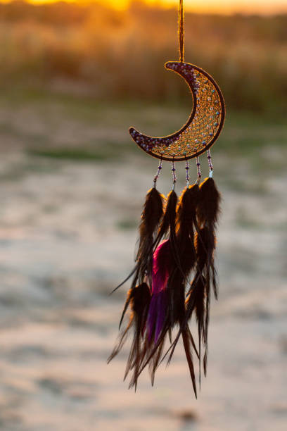 istock Handmade dream catcher with feathers threads and beads rope hanging 1271067256