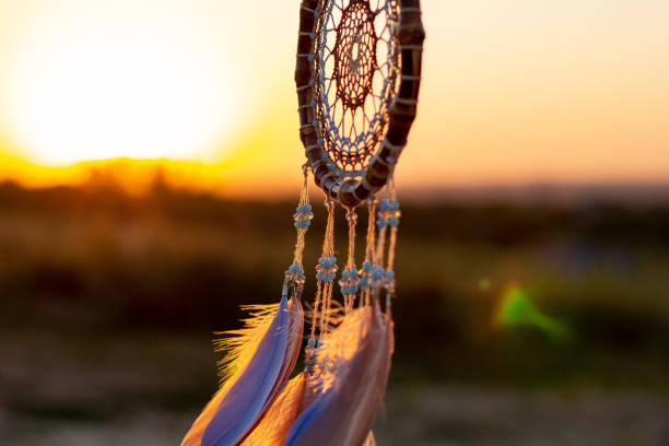 istock Handmade dream catcher with feathers threads and beads rope hanging 1271067257