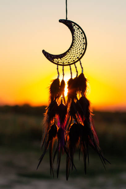 istock Handmade dream catcher with feathers threads and beads rope hanging 1271067260