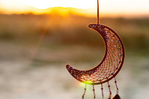 Dream catcher with feathers threads and beads rope hanging. Dreamcatcher handmade