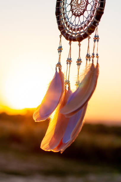 istock Handmade dream catcher with feathers threads and beads rope hanging 1271067265