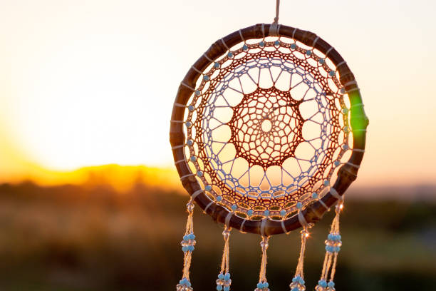 istock Handmade dream catcher with feathers threads and beads rope hanging 1271067269