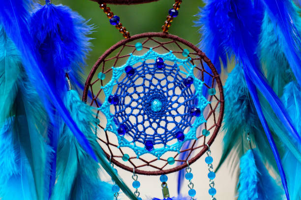 istock Handmade dream catcher with feathers threads and beads rope hanging 1271067283