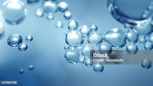 Full Frame Macroscopic Bubbles Beneath Water Stock Photo - Download Image Now - Water, Hydrogen, Bubble