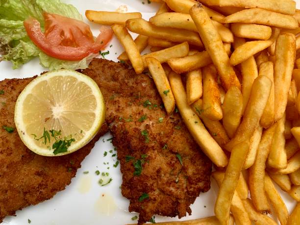 istock Schnitzel with French Fries 1271070724