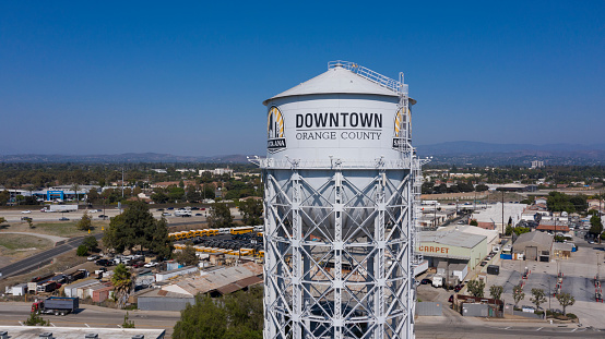 Santa Ana, California / USA - September 4, 2020: Sun shines on the historic 1928 Water tower near the city's downtown district.