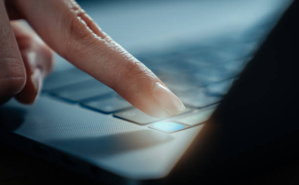 hands touch fingerprint on the laptop screen scanner to access personal user online. - fingerprint scanner imagens e fotografias de stock