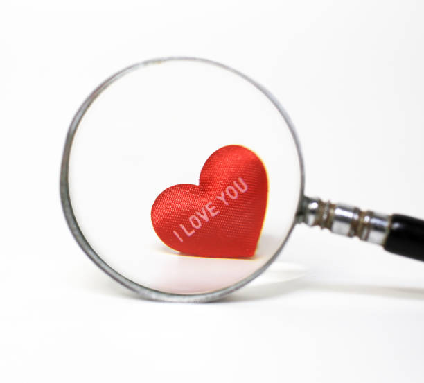 istock Magnifying glass search for love 1271072583