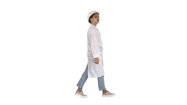 istock Engineer woman walking and checking the object on white background 1271078739