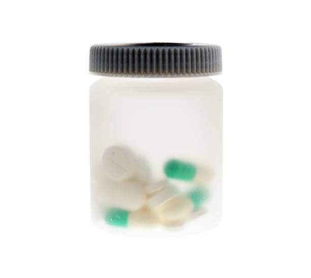 istock pills in a plastic jar on a white background 1271079700