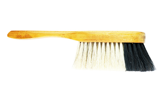 New brush broom for cleaning on white background, concept of household duties