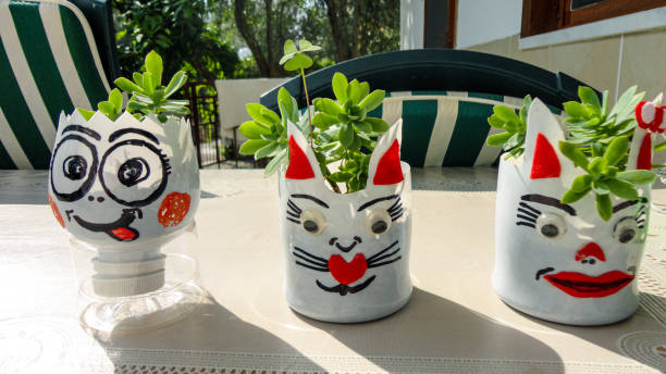 istock Handmade funny flowerpot made by plastic material 1271079958