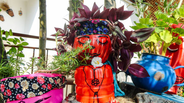 istock Handmade funny flowerpot made by plastic material 1271080042