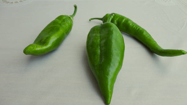istock fresh and organic green pepper isolated on the white background 1271084320