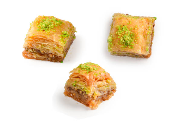 istock Pistachio baklava on a white background. Dessert. 1271084464