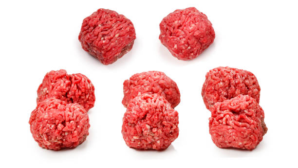 istock Raw meat balls isolated on white background. 1271084466