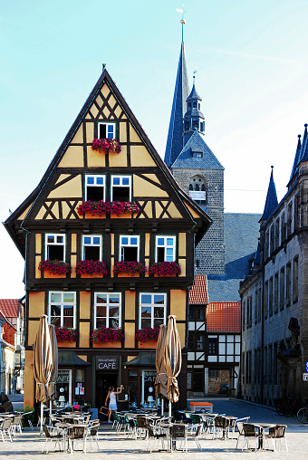 View of a Half timbered house at the main square in Quedlinburg old town.\n\nQuedlinburg old town comprises mainly half-timbered houses (Fachwerk, in German), cobbled streets, and some very old, often Romanesque churches. It is a Unesco World Heritage site.\nThe town wall was built in 1330 and has been preserved since then.
