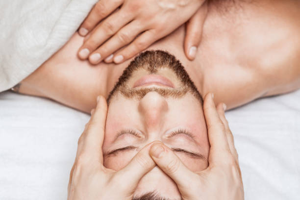 istock Man receiving relaxing head massage. 1271085637