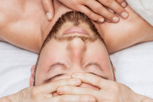 istock Man receiving relaxing head massage. 1271085659