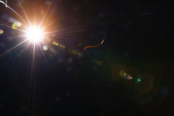 Abstract imitation sun starlight distant galaxy on a black background. -image