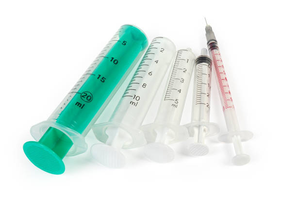istock Different disposable medical syringes on a white background close-up 1271088537