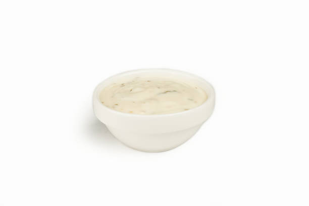 garlic sauce in a bowl on a white background. for the restaurant menu. traditional japanese sushi seasoning. healthy eating. - tartar sauce imagens e fotografias de stock