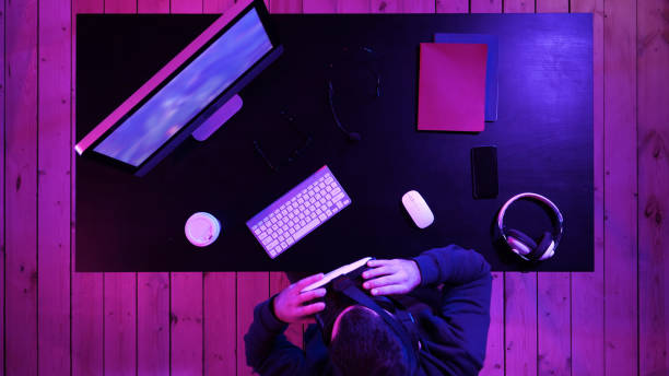 istock Young Man Wearing VR Headset And Experiencing Virtual Reality 1271090722