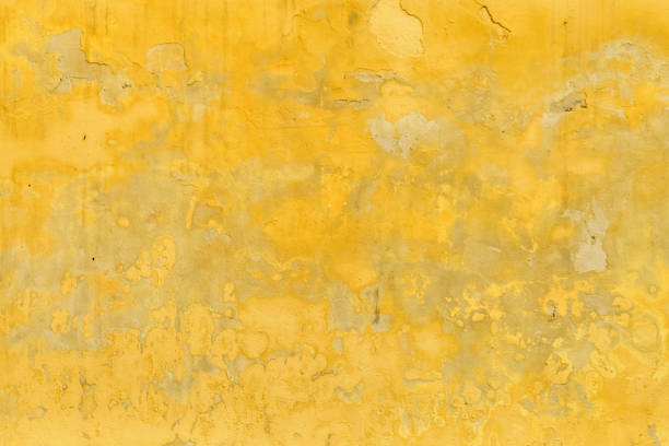 istock Old vintage background covered in yellow paint 1271091746
