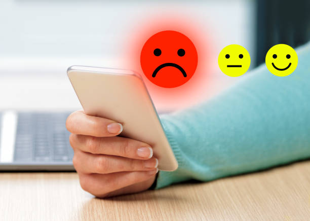 istock Businesswoman pressing unhappy icon 1271091920