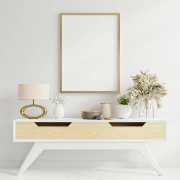 istock Mock up poster frame on cabinet in interior. 1271095911