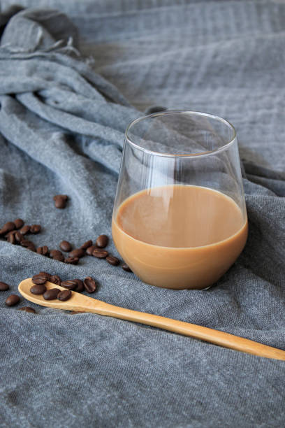 istock Latte coffee standing on gray cover, isolated background 1271099997