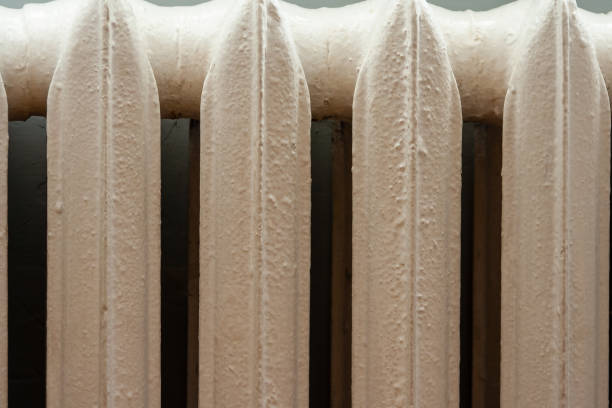 istock old radiator heater background - heater closeup. 1271100161