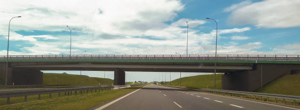istock Modern bridge over highway in Poland. Transportation concept. 1271100217