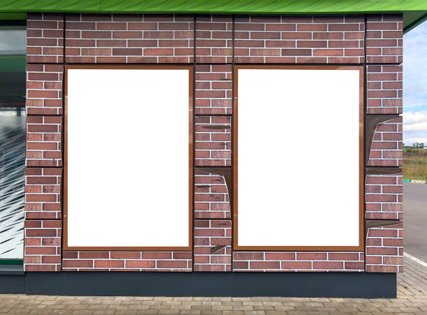 istock Modern empty blank advertising billboards banners on a wall in a city outdoors. Mockup for your advertising project. 1271101440