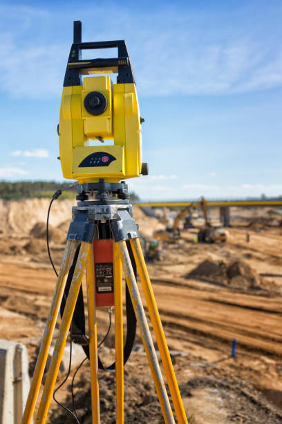 istock Land surveyor equipment on a highway construction site 1271107698