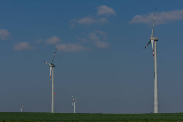 istock four wind turbines in the nature 1271108539