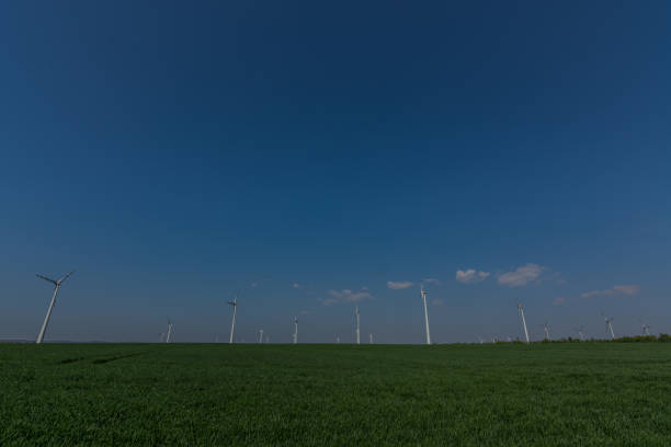 istock many wind turbines and blue sky 1271108547