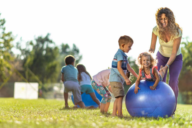 istock Group of kids playing in nature 1271109346