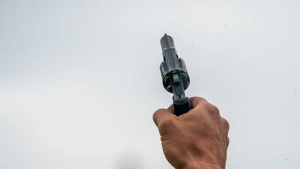 istock Shooting into the air withh a pistol 1271111236