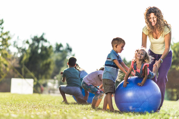 istock Group of kids playing in nature 1271113800
