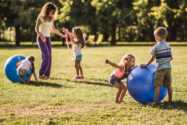 istock Group of kids playing in nature 1271113948