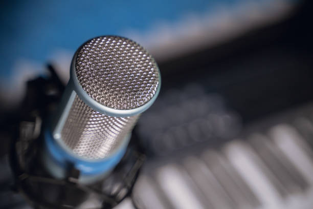 istock microphone in recording studio, close up, blurry background 1271115200