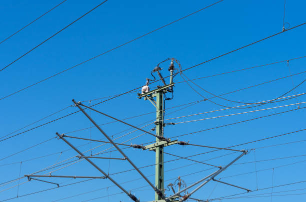istock Low Angle View Of Electricity Pylon Against Blue Sky 1271116887