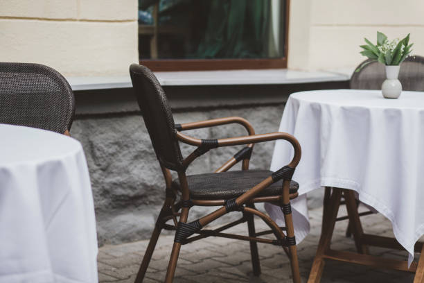 istock empty tables of outdoor cafe 1271118243