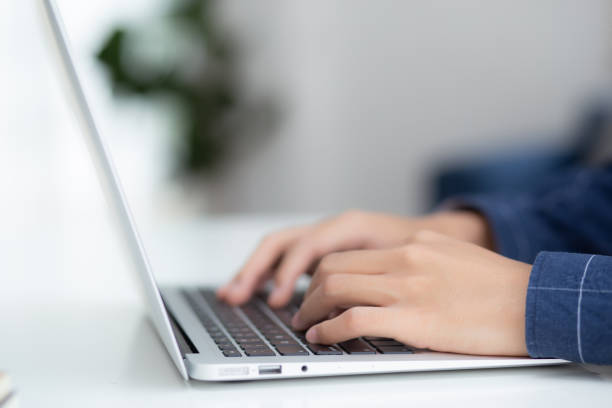 istock Hand of business man working from home using laptop computer to internet online on desk, lifestyle of new normal, social distancing, freelance work in stay home, employee using notebook indoor. 1271121386