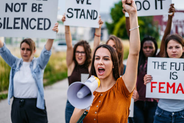 istock Women protesting for equality and women rights 1271122786