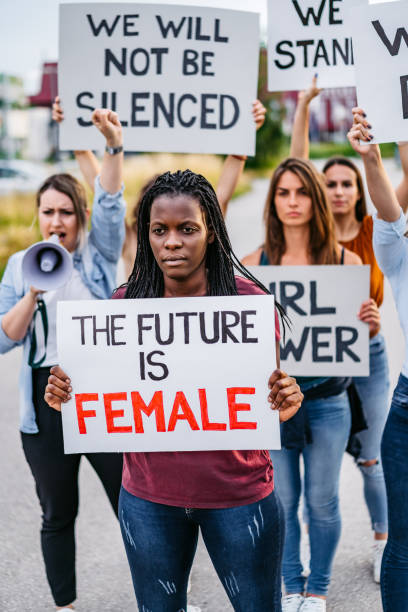 istock Women protesting for equality and women rights 1271122825