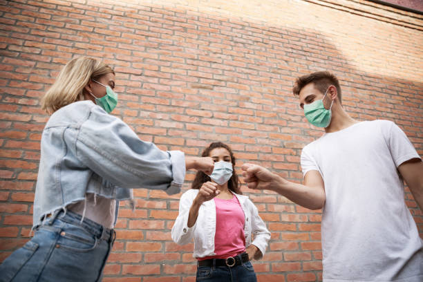istock Fist bumps as a new cool greeting method 1271124984
