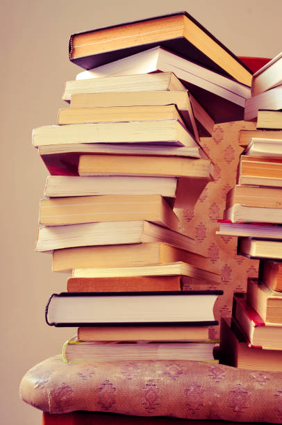 istock books on a chair 1271129257